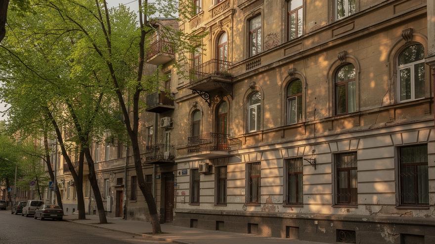 Restored early 1900s apartment building on a tree lined street in central Kyiv